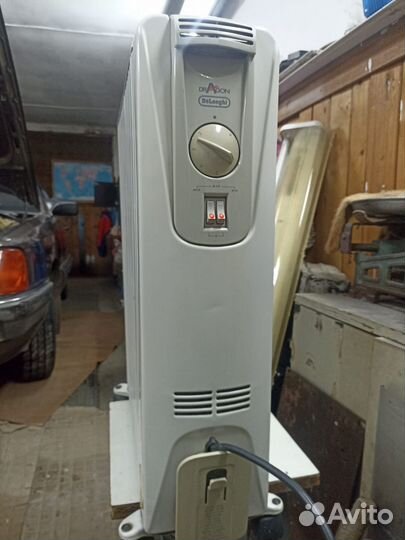 Масляный обогреватель delonghi