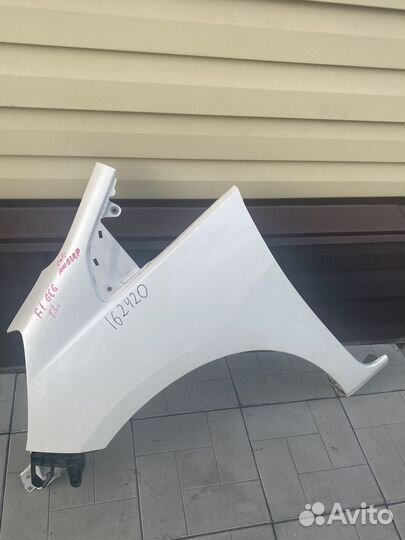 Левое крыло Honda Fit