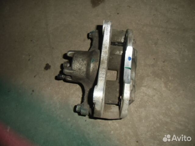 Суппорт передний левый Mitsubishi Lancer X 2007-н