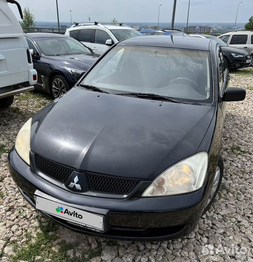 Mitsubishi Lancer 1.6 МТ, 2009, 149 000 км