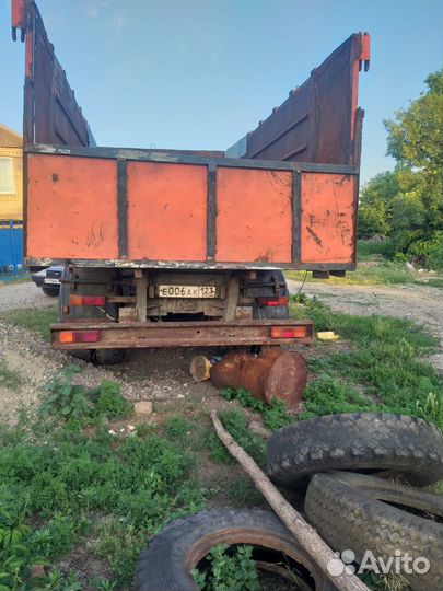 Мусоровозный контейнер