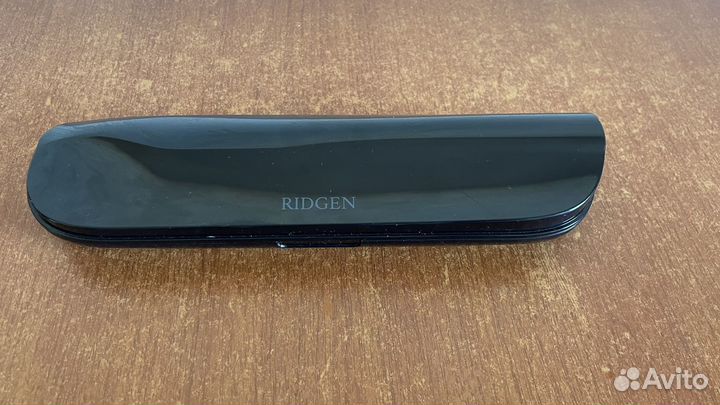 Электрическая зубная щетка