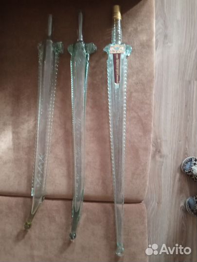 Бутылки в форме меча и сабли от коньяка