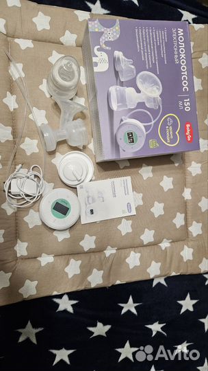 Продам новый электронный молокоотсос