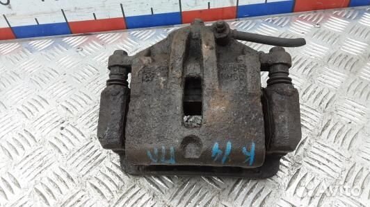 Суппорт тормозной передний левый KIA sportage 2 (1