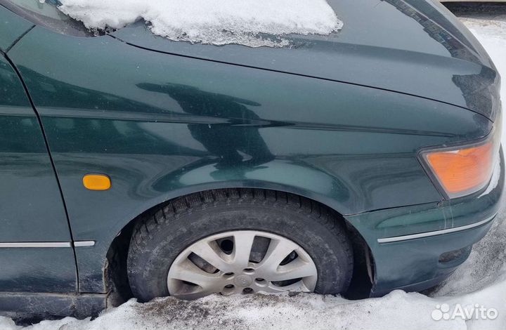 Крыло правое переднее Vista