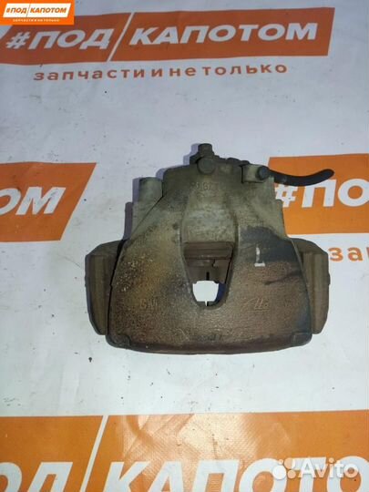 Суппорт тормозной передний левый Opel Astra