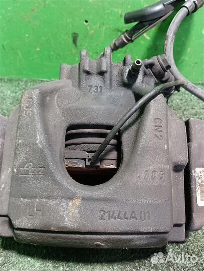 Суппорт тормозной передний левый Citroen C5 2009