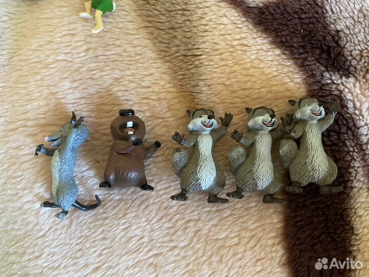 Игрушки из киндер сюрприза Тайна тр план Дисней