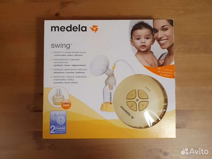 Молокоотсос medela swing