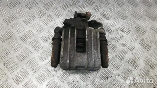 Суппорт тормозной задний левый skoda rapid (NKR02L