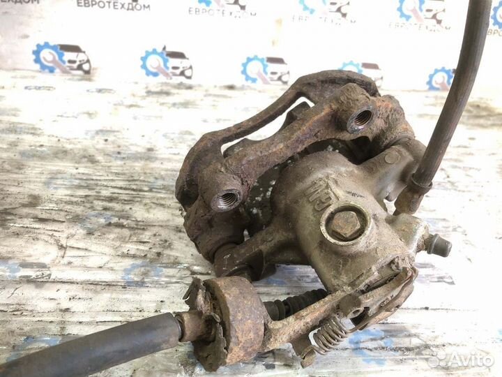 Суппорт передний правый Opel Astra G универсал