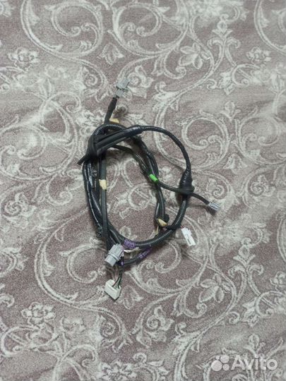 Проводка багажника Аксела