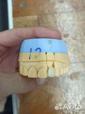 Зубной техник керамист