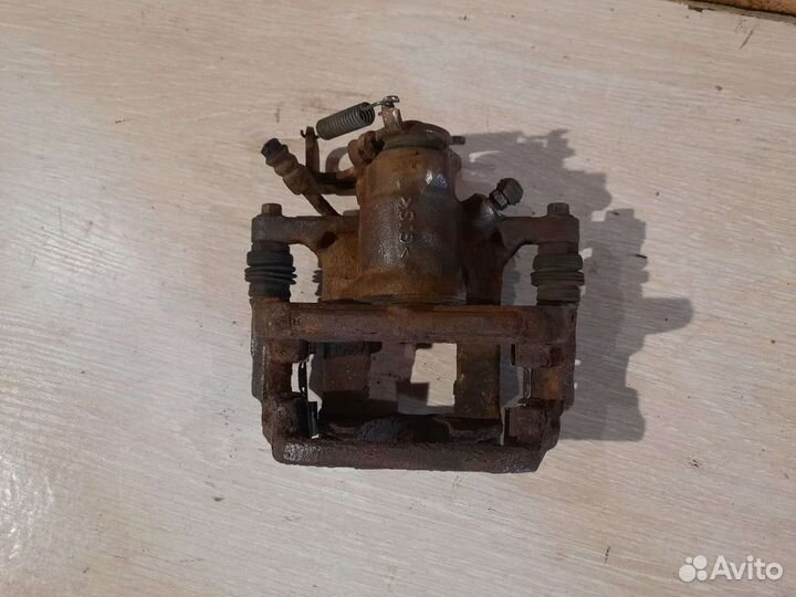 Суппорт задний левый Opel Mokka 4WD