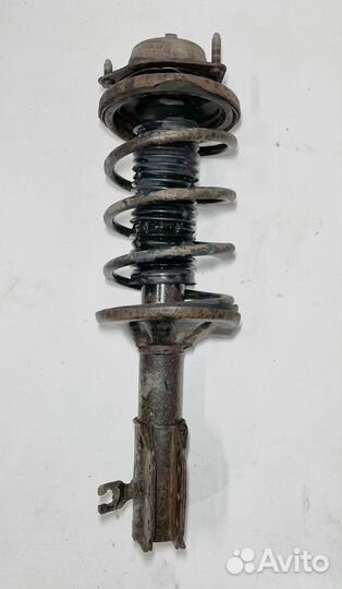 Стойка передняя левая в сборе Mazda 323 BA