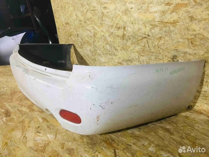 Бампер задний Дорест Nissan Wingroad Y11 Белыйдефе