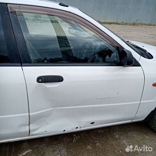 Дверь правая передняя mazda familia 2002 год