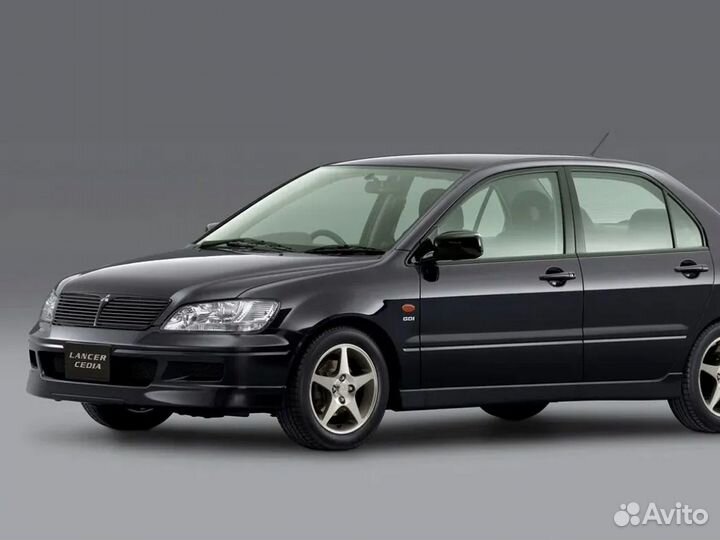 Стекло фары левое mitsubishi lancer cedia 00-02