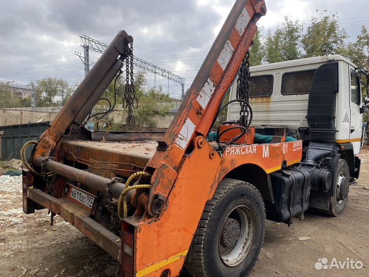 Маз 5550В2 бункеровоз-мусоровоз с кму