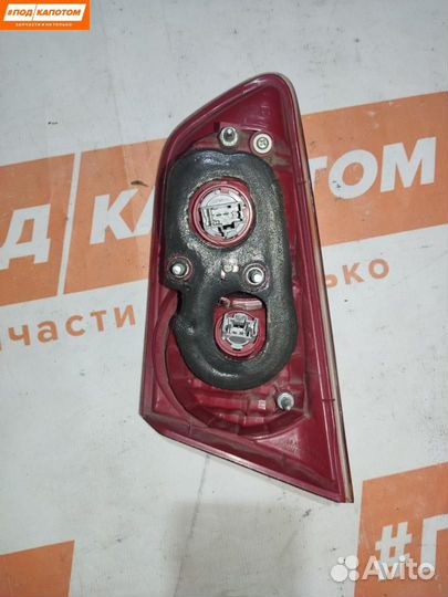 Фонарь крышки багажника левый Mitsubishi Lancer 10