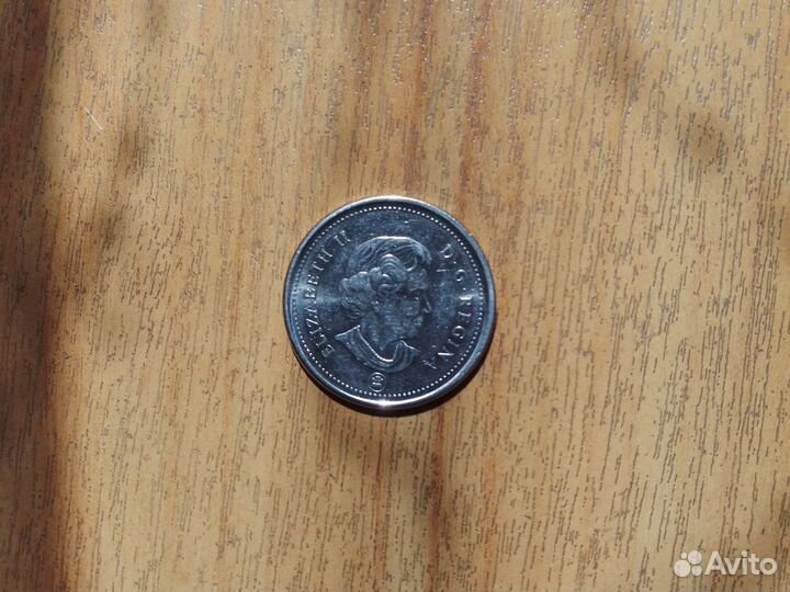 Монета 25 центов 2006 года