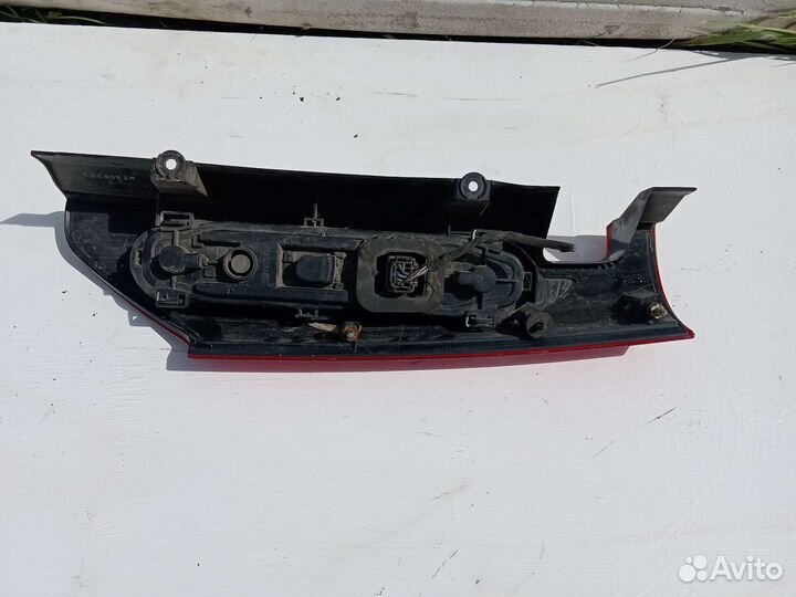 Фонарь задний левый рено кангу