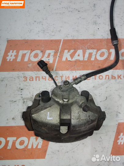 Суппорт тормозной передний левый Skoda Octavia