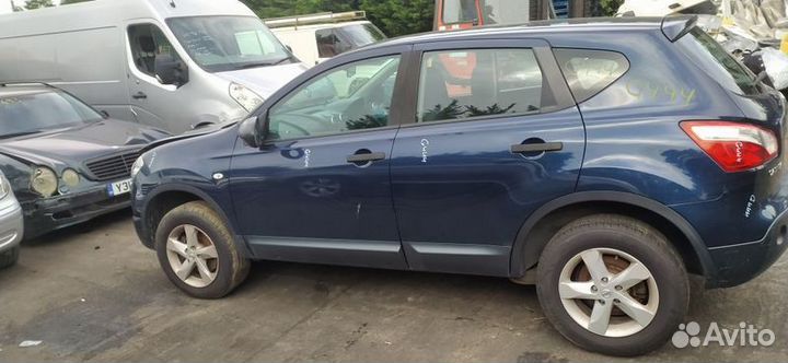 Суппорт передний левый Nissan Qashqai J10