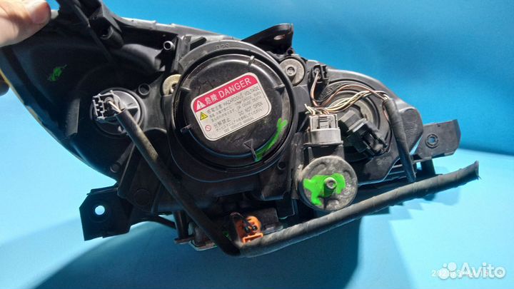 Фара левая для Mazda 3 2003-2009