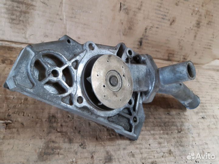 Помпа водяная Киа Спектр 1.6