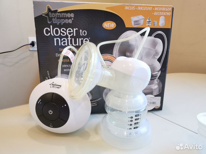 Электрический молокоотсос и стерилизатор