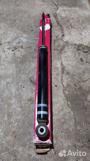 Амортизатор задний Nissan Tiida C11 оригинал