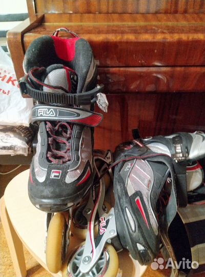 Роликовые коньки