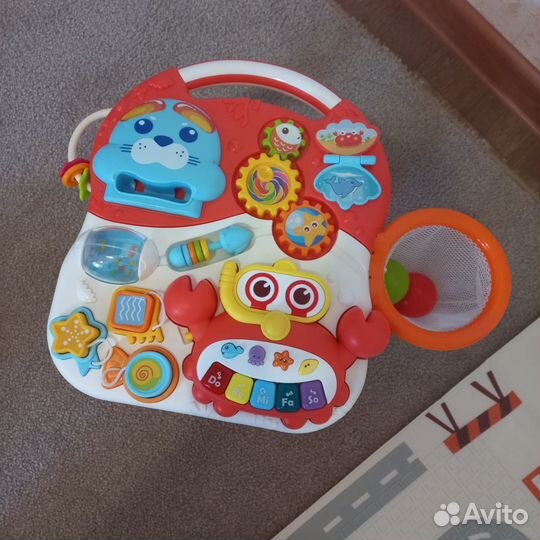Каталка детская с игровым столиком