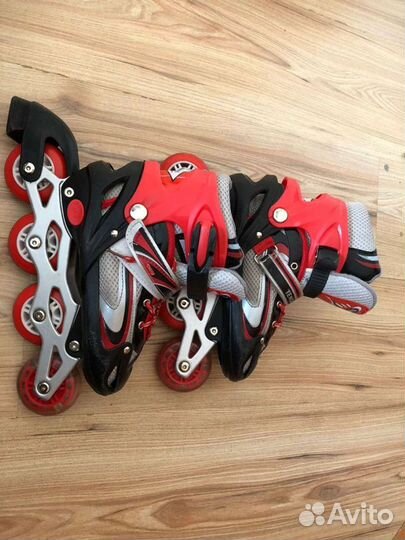 Роликовые коньки