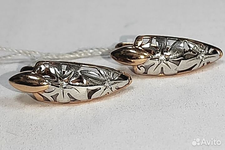 Золотые серьги с камнем