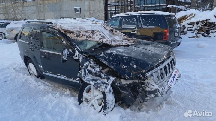 Трос кпп Jeep Grand Cherokee (WH) 52090445AC