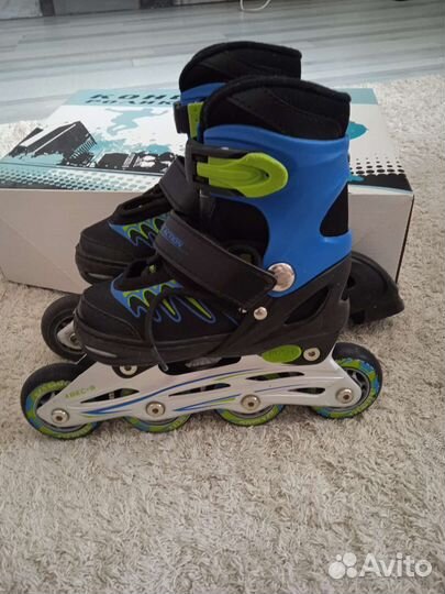 Роликовые коньки