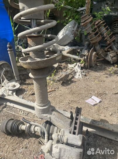 Передняя левая стойка Daewoo Nexia 1, 2