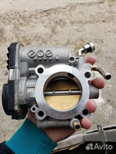 Дросельная заслонка