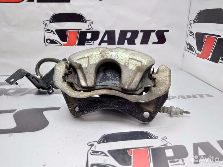 Суппорт тормозной передний Mitsubishi Lancer