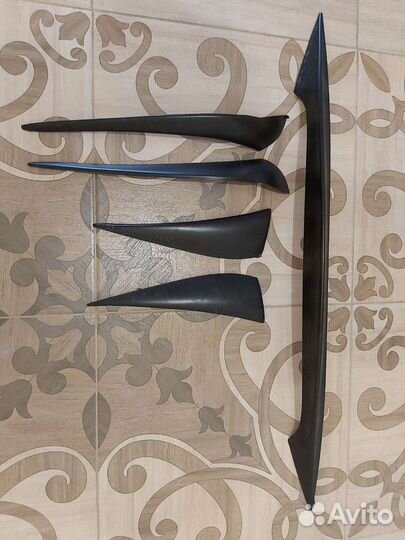 Реснички на заднюю оптику и спойлер на крышку бага