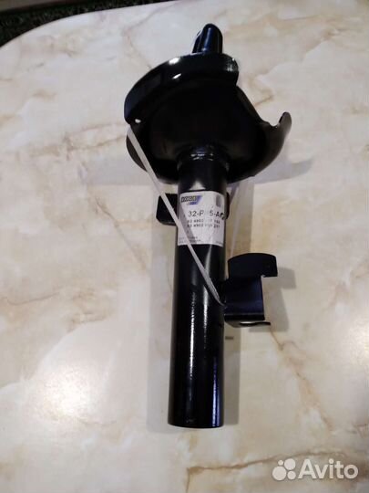 Передний амортизатор