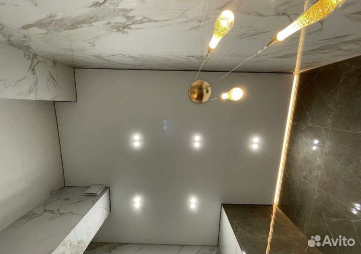 Монтаж натяжных потолков,слив воды