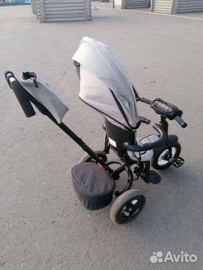 Трехколесный велосипед с ручкой