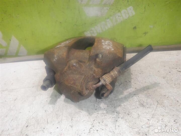 Суппорт передний правый Форд Торнео Коннект