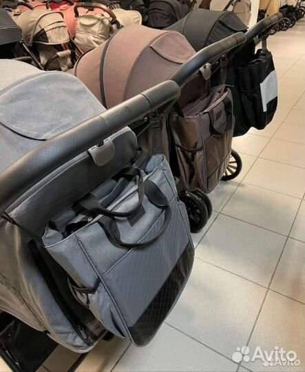 Коляска с большими колесами и перекидной ручкой