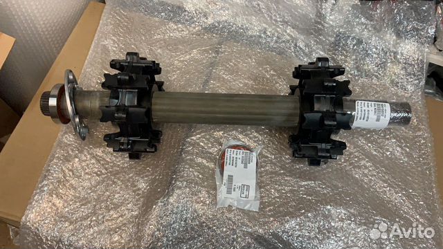 вал привода гусеницы