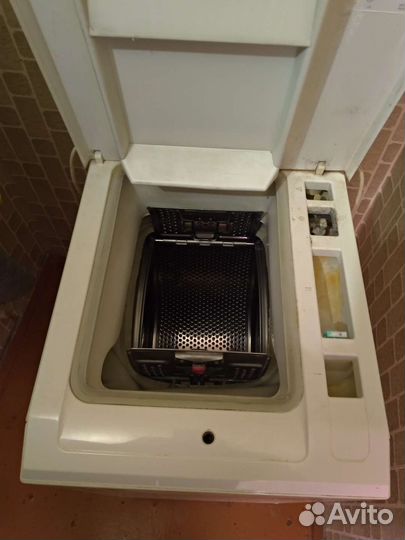 Стиральная машина с вертикальной загрузкой